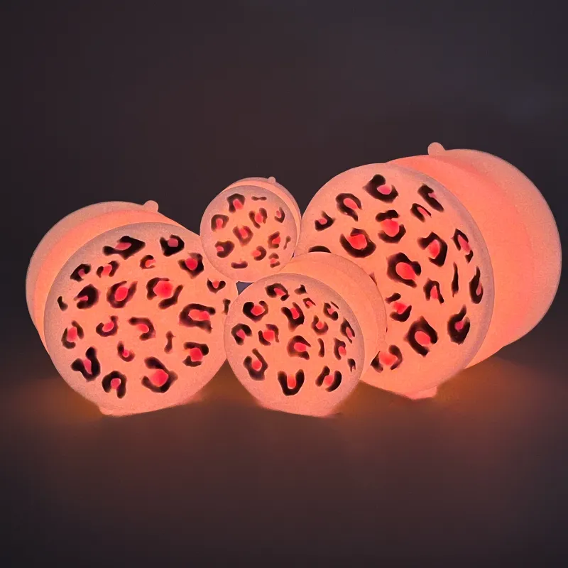 Tentickle Jem Leopard dubbele zuignap medium glow